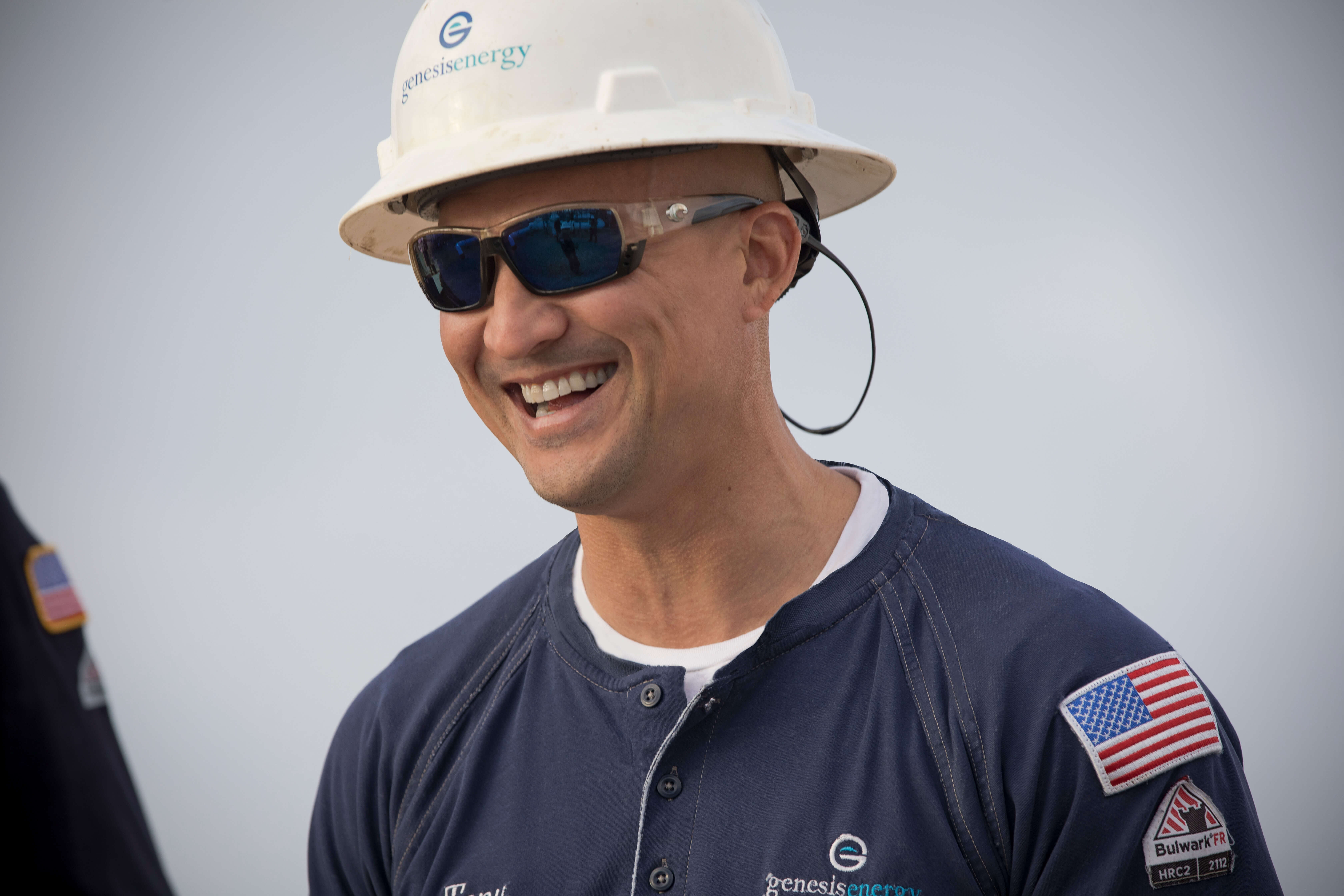 Smiling male Genesis Energy employee